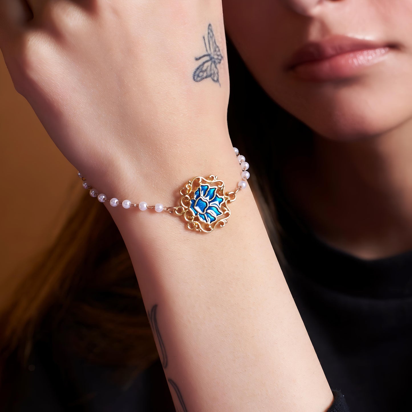 Serenity Lotus Blue Charm Gold Bracelet by Gleamy