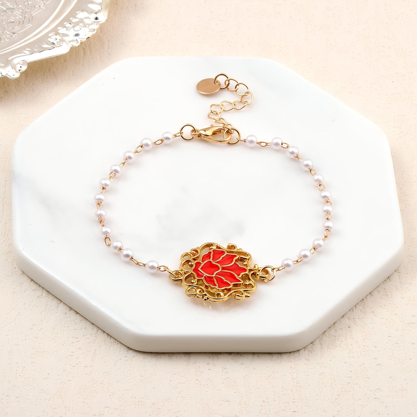 Serenity Lotus Red Charm Gold Bracelet by Gleamy