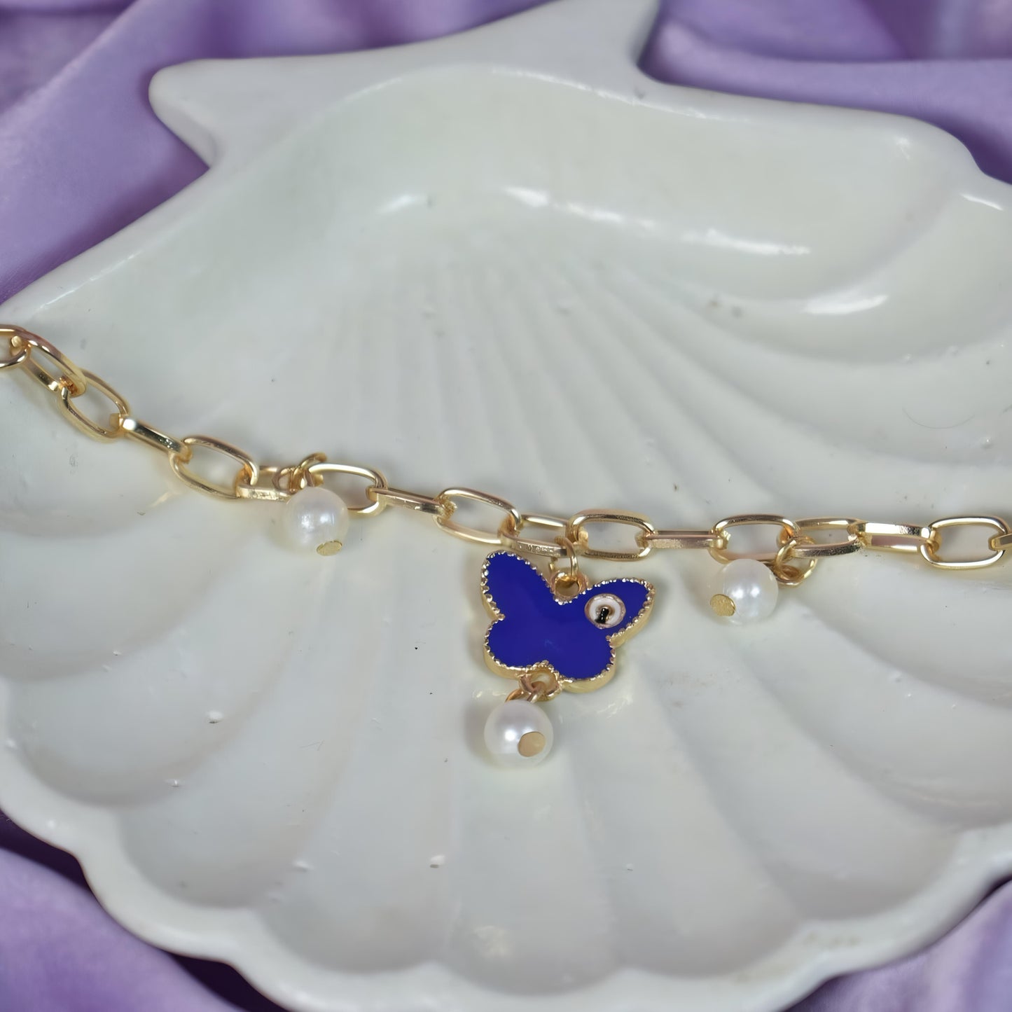 Butterfly Painted Evil Eye Bracelet by GLEAMY