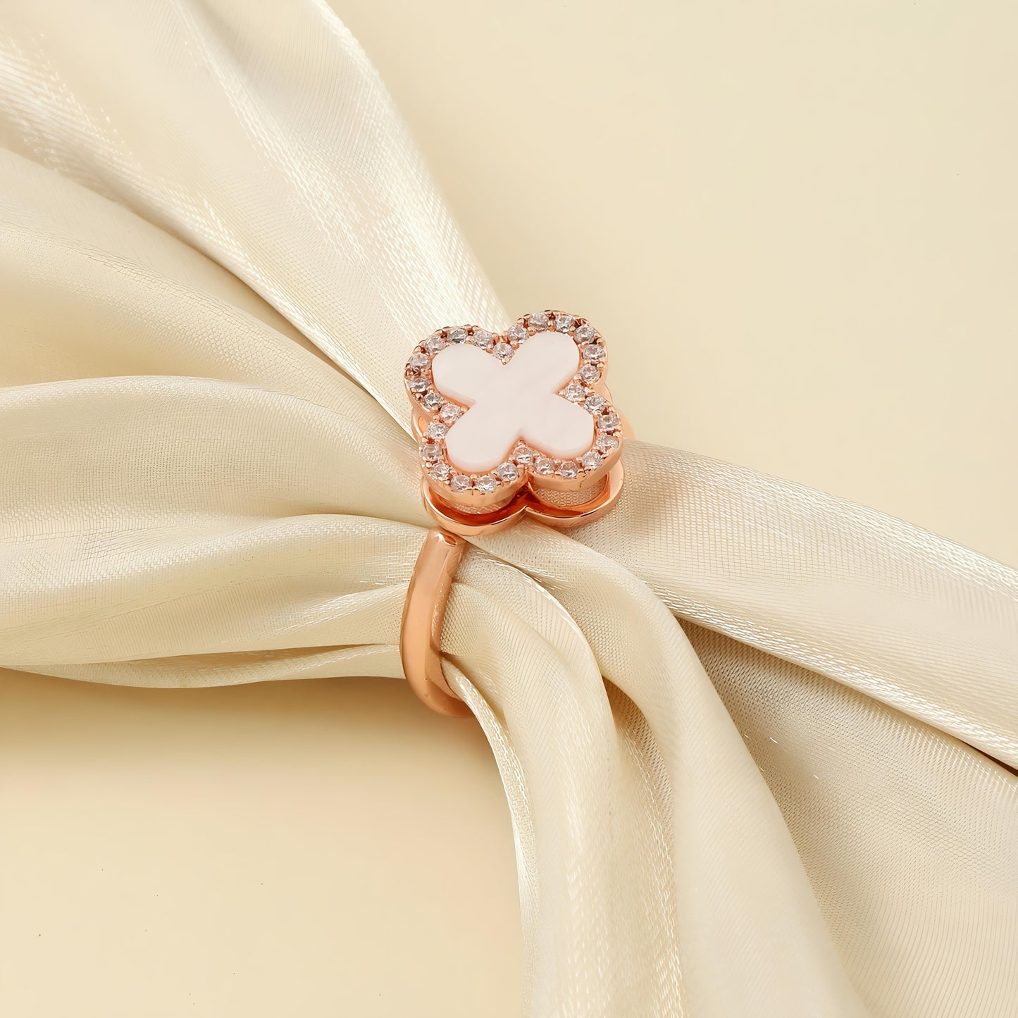 Arcelia White Clover Spinner Ring by GLEAMY