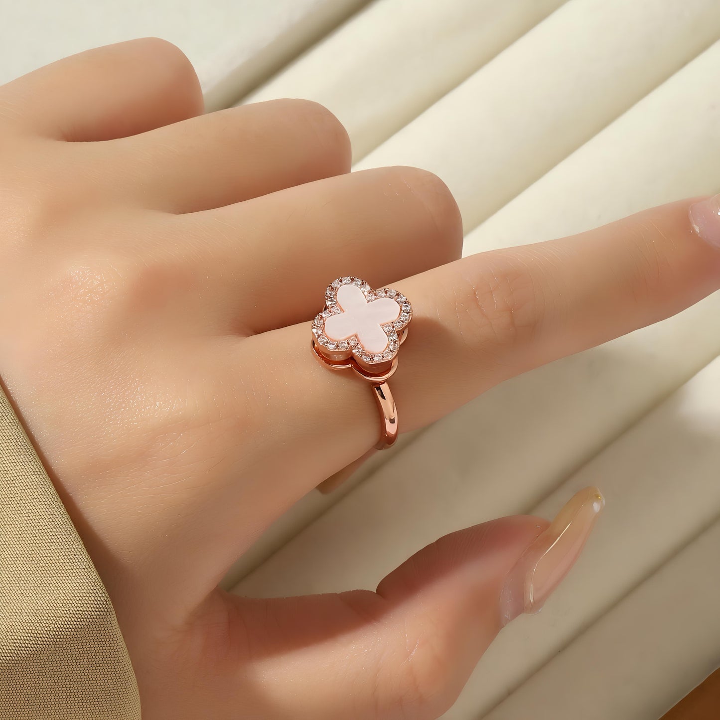 Arcelia White Clover Spinner Ring by GLEAMY
