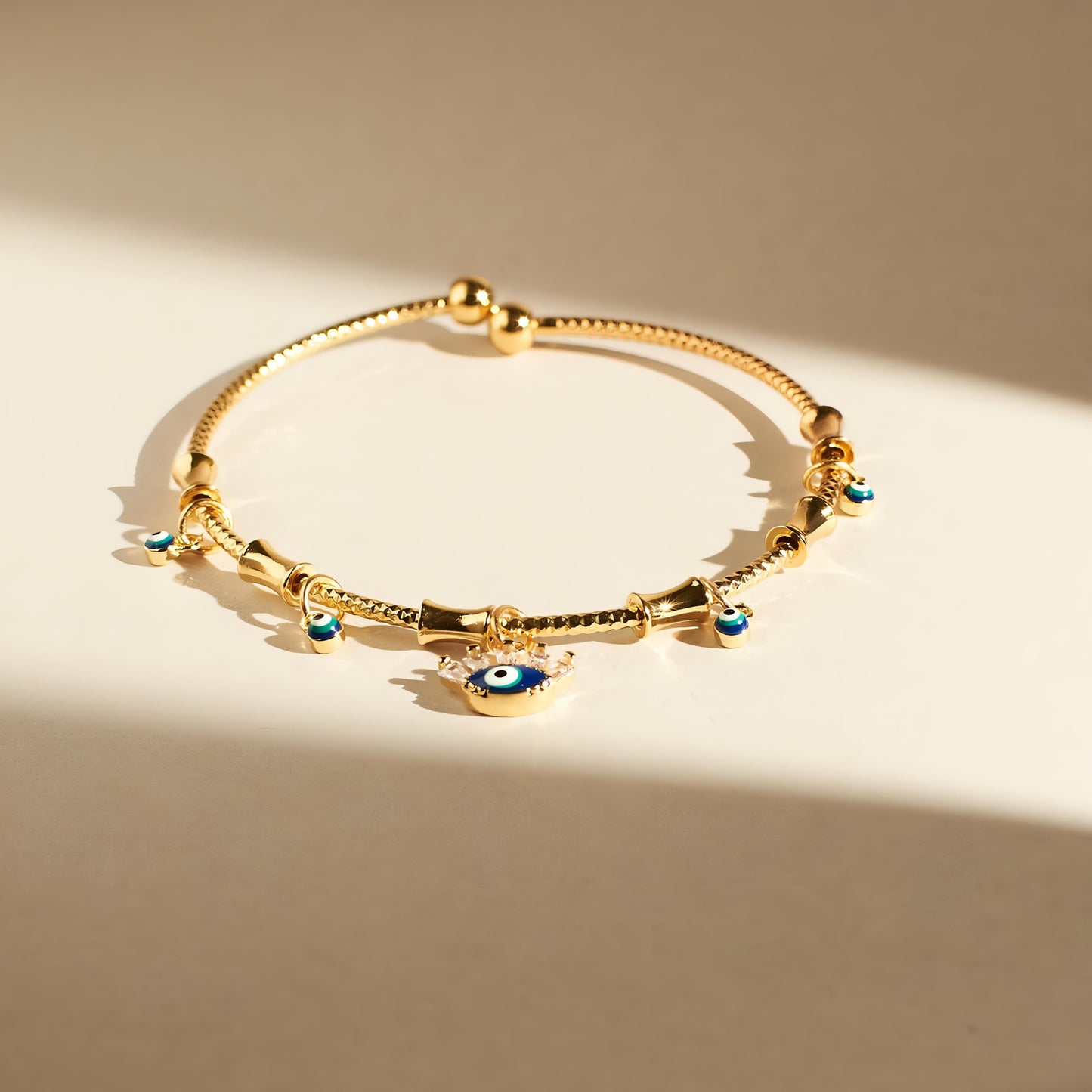 Chic Evil Eye Tassel Bangle By Gleamy