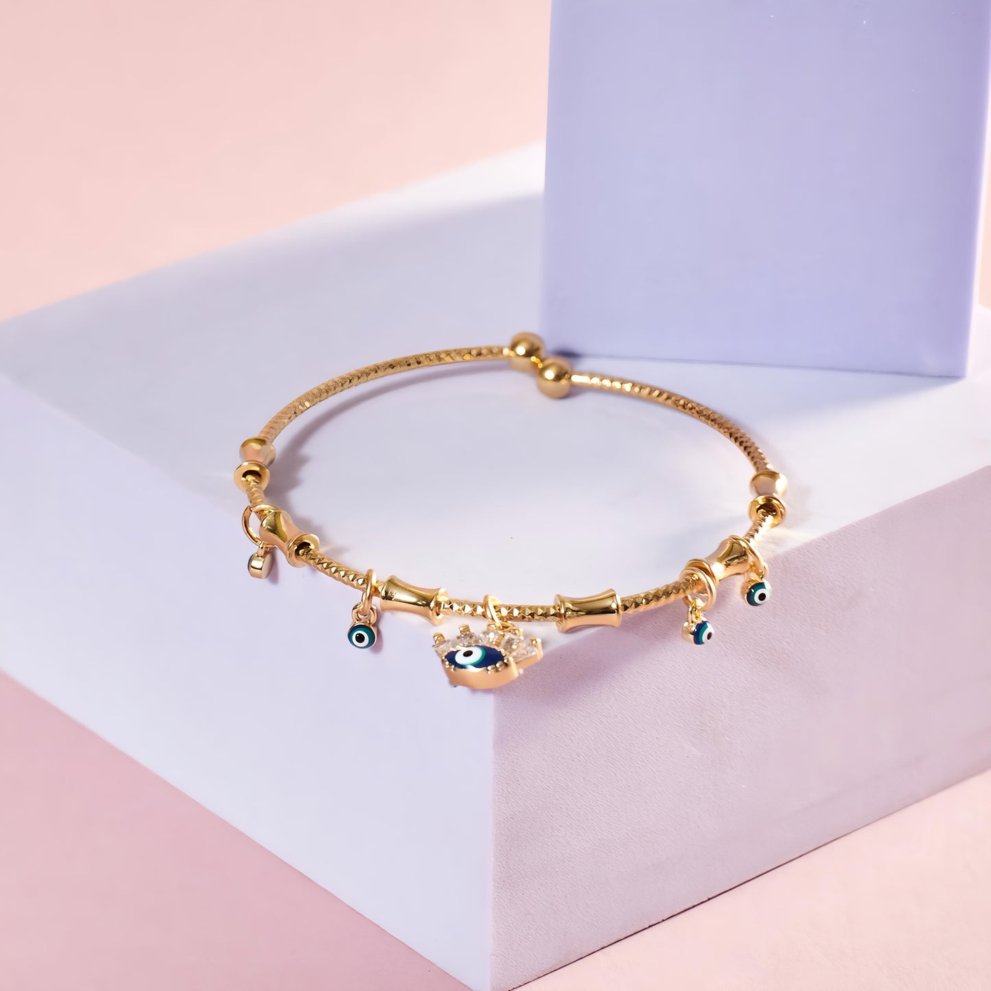 Chic Evil Eye Tassel Bangle By Gleamy