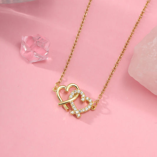 Linked Hearts Necklace by GLEAMY