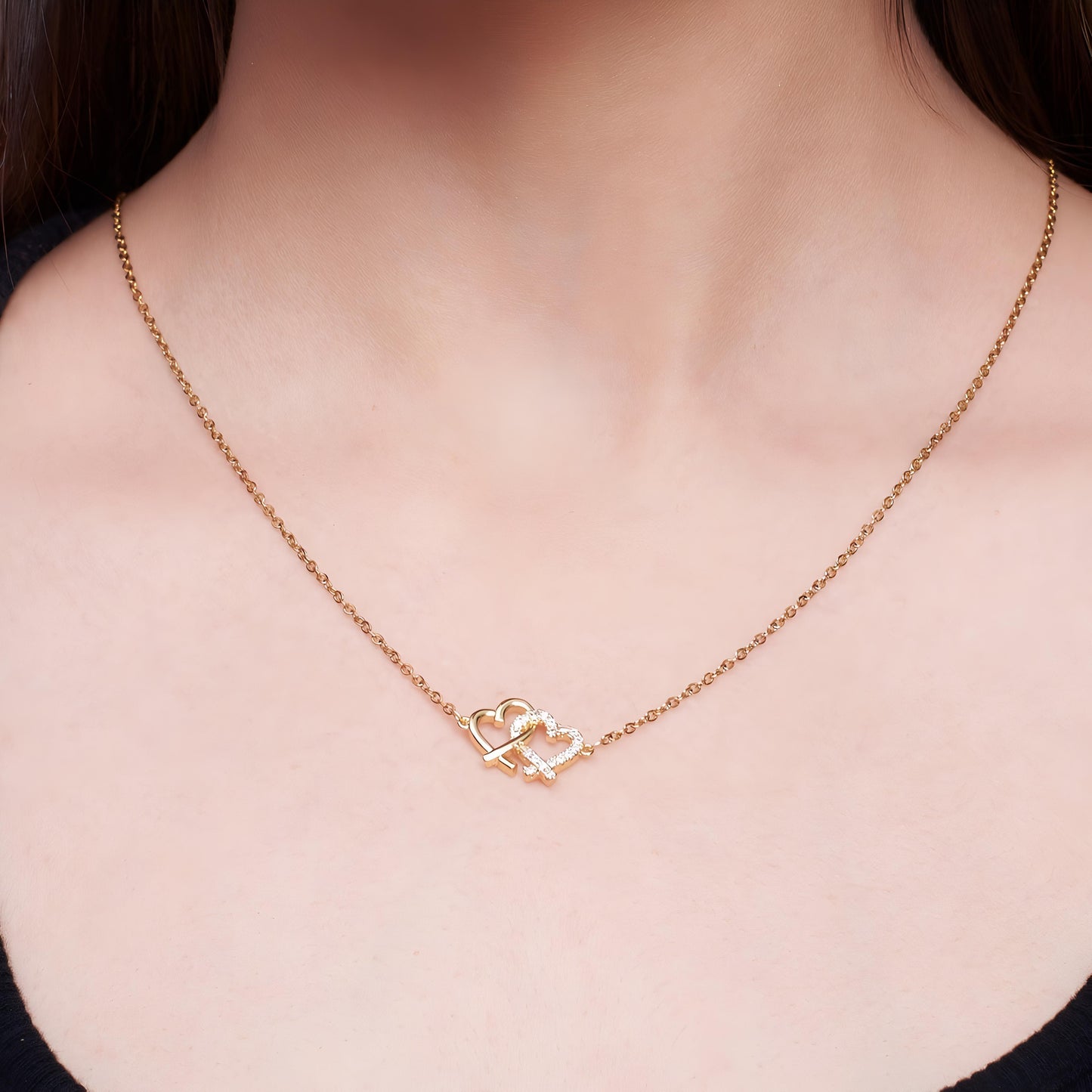 Linked Hearts Necklace by GLEAMY