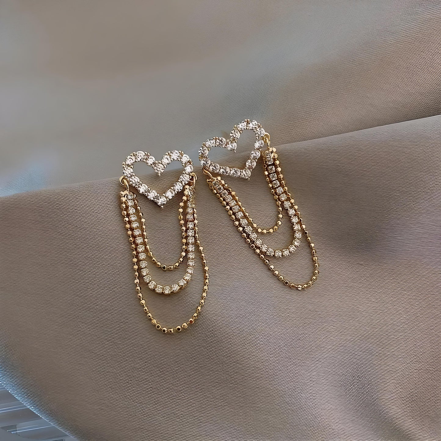 Elegant Heart Chain Earrings By Gleamy